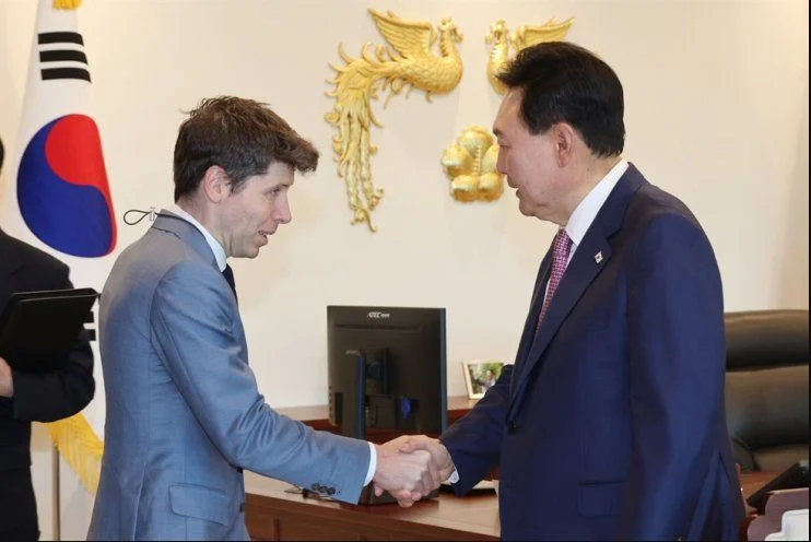 OpenAI CEO Sam Altman and Korean President Yoon Suk Yeol shake hands at the Yongsan District, central Seoul presidential office on June 9.