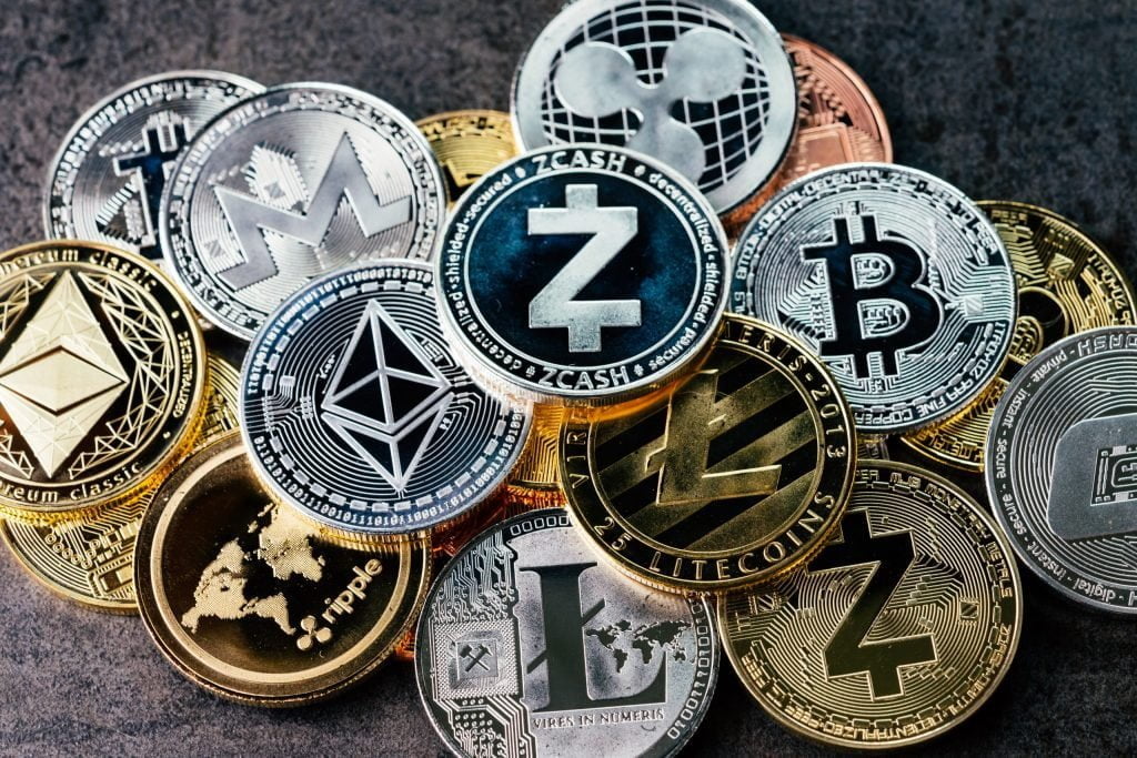 crypto currency background with various of shiny silver and golden physical cryptocurrencies symbol coins bitcoin ethereum litecoin zcash ripple stockpack adobe stock scaled 1 - Coinscreed Latest Bitcoin and Crypto Updates