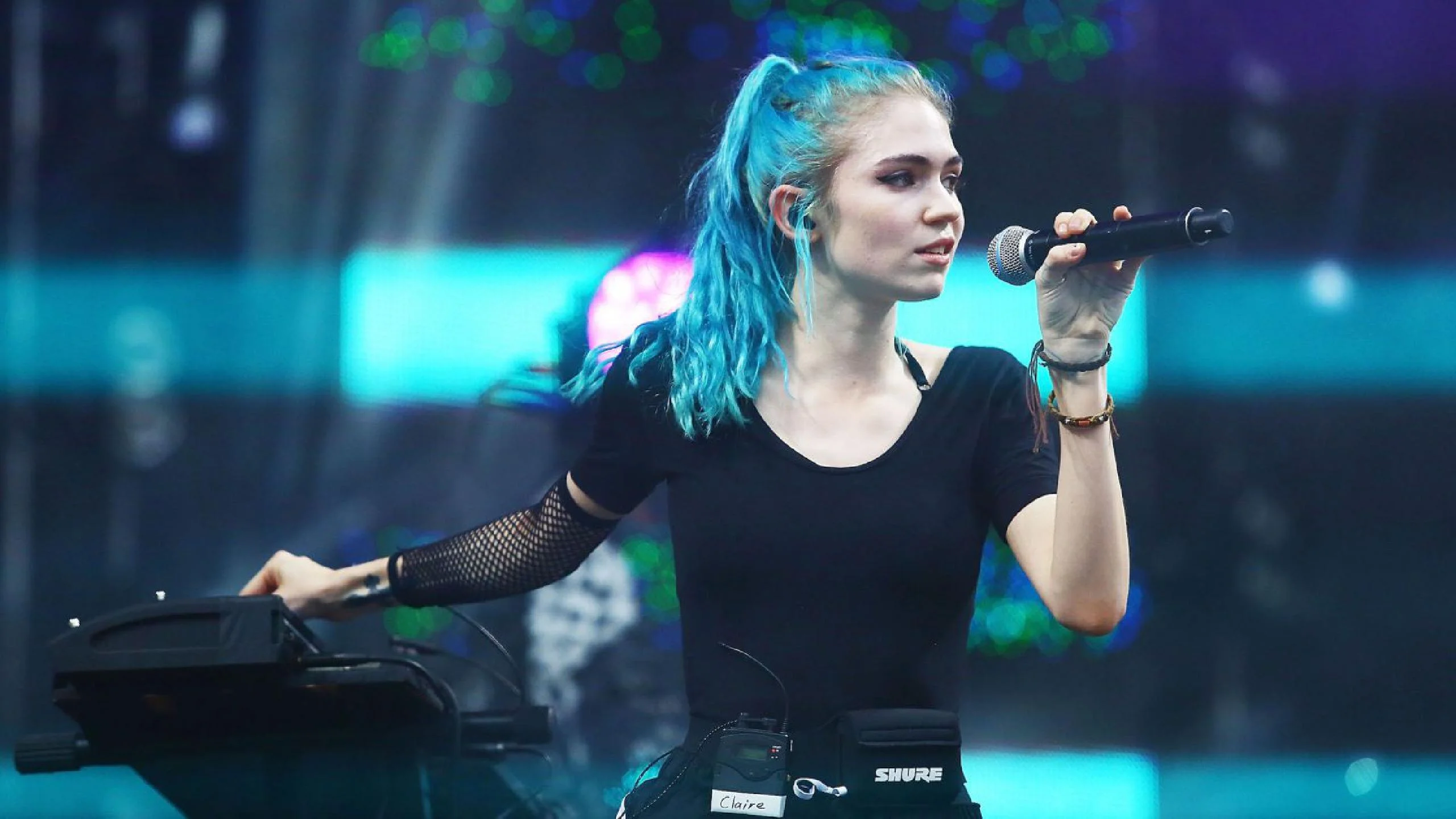 Grimes to share royalties with AI musicians